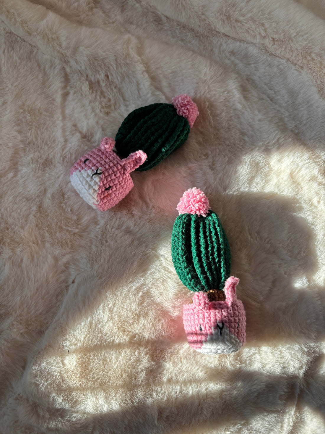 Crochet cactus with pink pom-pom in a pink bunny pot, 10 cm